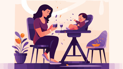 Happy young mother feeding her baby in highchair co