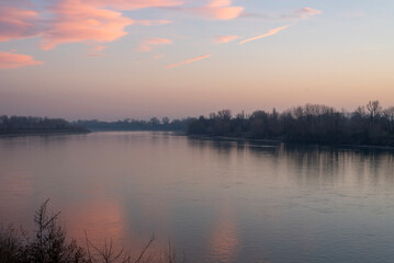 Fototapeta na wymiar The Po river is dressed in pink, Cremona.