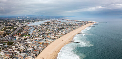 Panoramic Aerial View of Waves Crashing into Newport Beach's Jetties