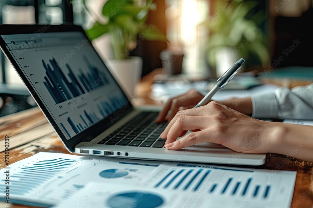 Poster Financial analysts analyzing market trends and data on a laptop, Analyzing market trends and data on a laptop, financial analysts work diligently.