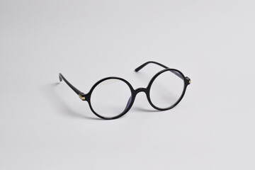 Stylish glasses with round black frames isolated on white background. anti-UV glasses