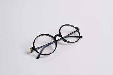 Stylish glasses with round black frames isolated on white background. anti-UV glasses