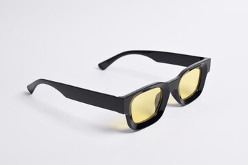 Stylish vintage sunglasses on white background