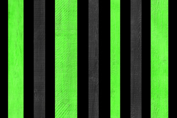 Green light verdant vertical lines stripe wooden fence board black background isolated plank object
