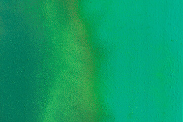 Abstract design green paint on blank wall surface texture background pattern