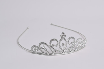 Silver princess crown isolated on white background © Mulad Images