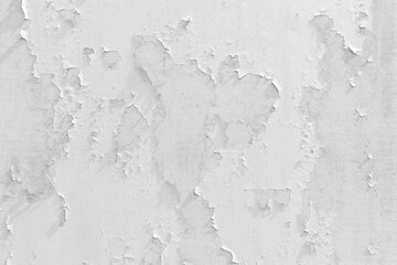 White bright old peeling paint cracked wall texture background worn shabby
