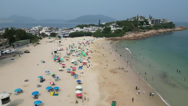 view of visitors at Shek O beach in Hong Kong , March 29 2024