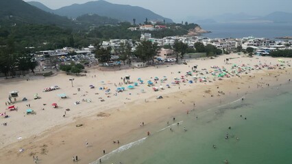 view of visitors at Shek O beach in Hong Kong , March 29 2024