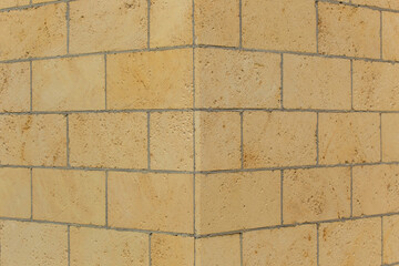 Brickwork brick masonry wall corner joint background architecture facade exterior building sand color limestone shellbrick