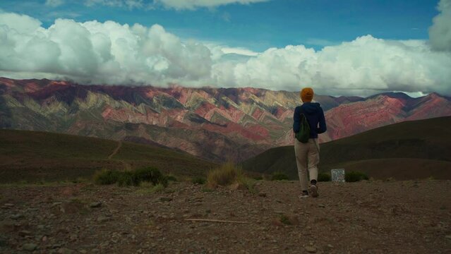 treveler in Cerro de los 14 Colores, or Fourteen Coloured Mountain, Serrania de Hornocal, Jujuy, Argentina
