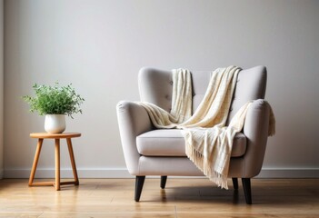 An armchair with a white plaid rests near a softly lit wall, exuding warmth and comfort