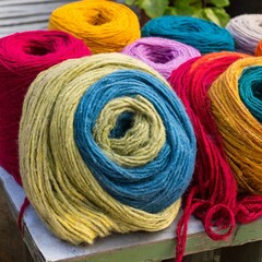 Vibrant Crafting: Colorful Wool Rolls Unraveling Creativity"