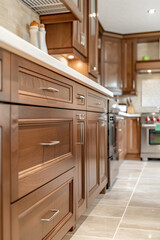 Modern Kitchen Showcasing Elegant Wooden Cabinet Installation and Ample Storage Space