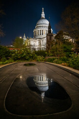 St Paul's Cathedral at night with reflection in the water. London. UK.