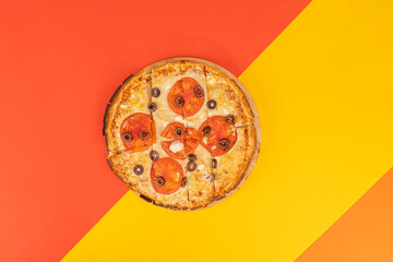pizza with feta cheese on colorful background