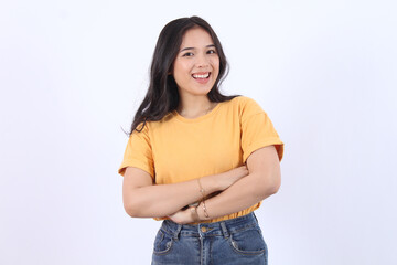 Cheerful Asian woman with confident smile looking at camera wearing yellow t-shirt isolated white background