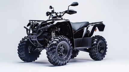 Rugged black ATV parked on white showcasing strength and adventure