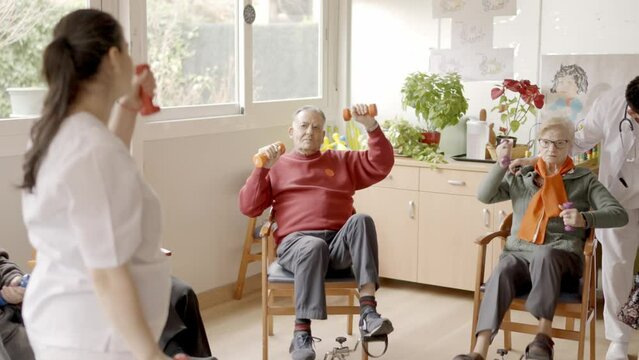 Senior exercising class in a nursing home