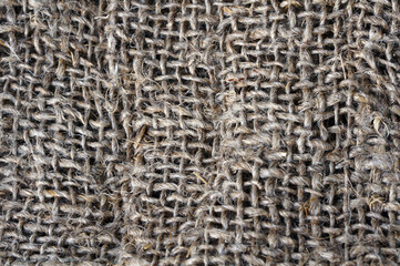 Background canvas fabric. Texture, material, fabric. Plain. Close-up view of rolled kitchen rags. Weaving threads, craft, fluffy, threads, tangled, natural resources