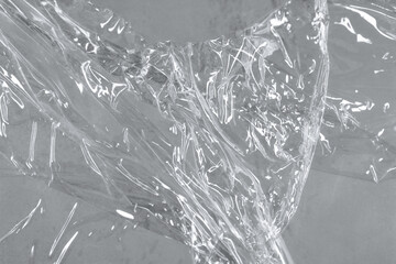 Wrinkled packaging stretch film. Texture of crumpled plastic stretch film