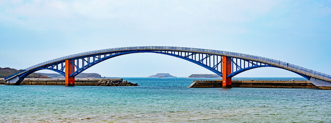View  of the Xiying Rainbow Bridge in Magong, Penghu Islands, Taiwan. - obrazy, fototapety, plakaty