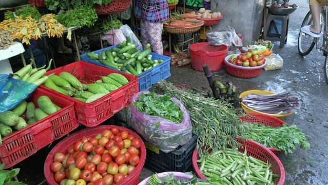 Vegetable stall at local outdoor farmers market in Vietnam. Close-up.