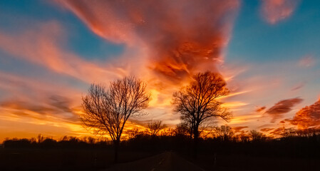 Sunset with dramatic clouds near Plattling, Isar, Deggendorf, Bavaria, Germany