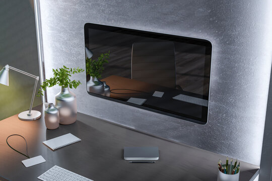 Modern home office setup with a computer monitor, desk, and accessories against a textured wall, presenting a contemporary workspace. 3D Rendering