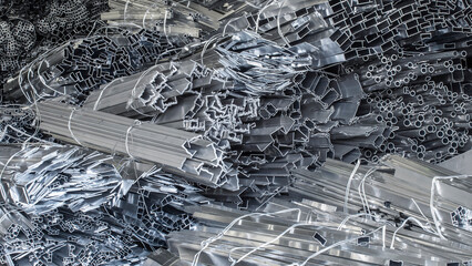 detail of pile of discarded aluminum profiles waiting to be recycled