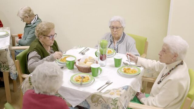 Top view of people eating in a nursing home