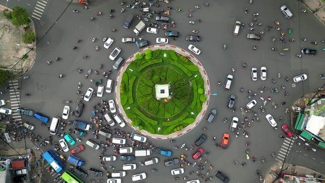 Top view of morning traffic at a roundabout in Ho Chi Minh City, Vietnam.