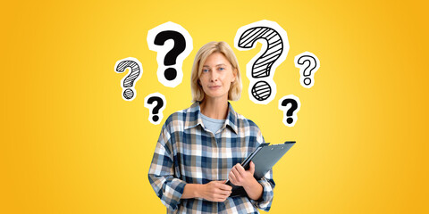 Blonde woman with clipboard in hands and question marks on colored background - 772060378