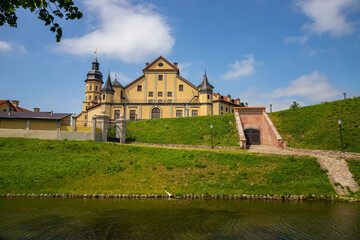 Fototapeta na wymiar Travel and tourist destination concepts. The famous Nesvizh Castle as a deep example of the medieval heritage and residence of the Radziwill family.