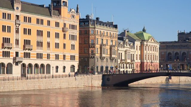 The Sagerska House, residence of the Swedish Prime Minister and historical buildings in central Stockholm, Sweden. Bridge over to the old town. Blue sky, early spring. River 