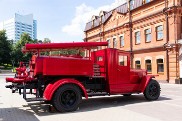 Old Russian, fire truck of red color. Exhibition copy.