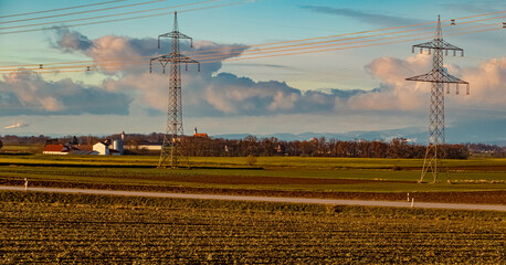 Winter view with overland high voltage lines at Wallerdorf, Kuenzing, Deggendorf, Bavaria, Germany