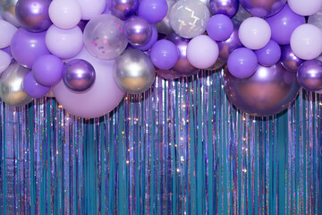 Photo corner decorated with balloons.