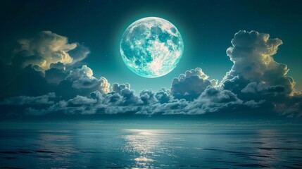Full moon over peaceful sea. Night sky with big blue moon rises above the sea among the clouds