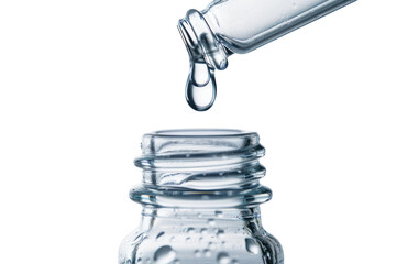 Drop of water falling from glass lab pipette in transparent bottle on white background. - obrazy, fototapety, plakaty
