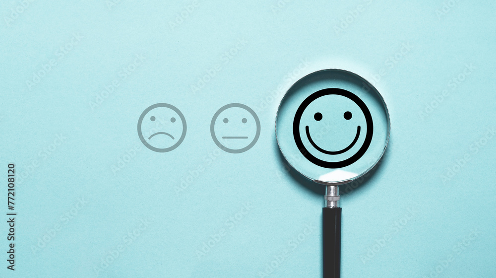 Aufkleber smile face icon inside magnifier glass for customer excellent evaluation and feedback survey after u