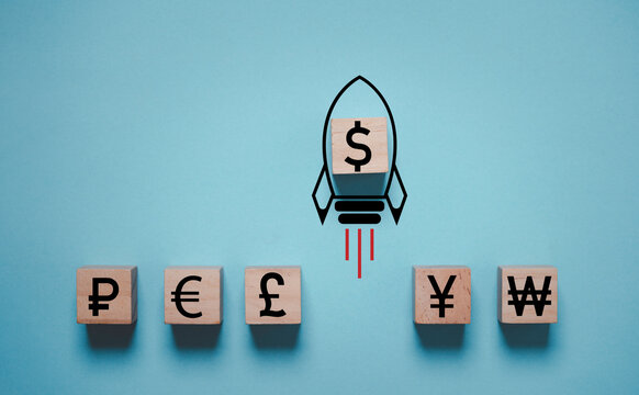USD dollar sign with missile rocket move rising from other currency include ruble euro pound sterling yuan and won for FED increasing percentage interest to reduce inflation concept. - Powered by Adobe