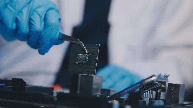 Close up portrait of computer engineer's hand is holding CPU's computer.