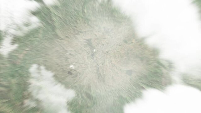 Earth zoom in from space to Fianarantsoa, Madagascar. Followed by zoom out through clouds and atmosphere into space. Satellite view. Travel intro. Images from NASA