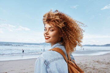 Smiling Woman on Beach, Embracing Freedom and Happiness in a Wide Angle Portrait