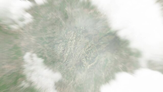 Earth zoom in from space to Rahovec, Kosovo. Followed by zoom out through clouds and atmosphere into space. Satellite view. Travel intro. Images from NASA