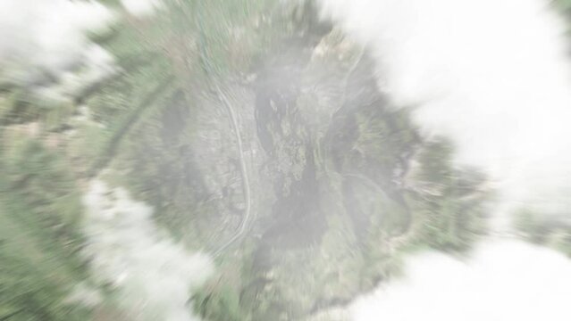 Earth zoom in from space to Triesenberg, Liechtenstein. Followed by zoom out through clouds and atmosphere into space. Satellite view. Travel intro. Images from NASA