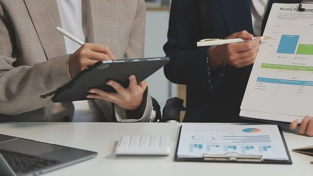 Asia real estate sale agent, stock market trader woman work at bank office talk in tax plan report. Lawyer help ask or advice lease on laptop desk typing fund loan data. Smile happy trust in HR job.