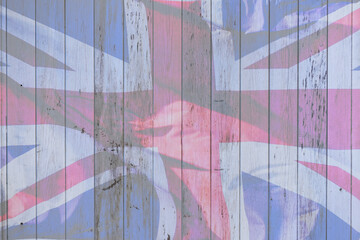 Union Jack flag on vintage style wooden background