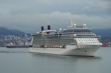 Modern cruiseship or cruise ship liner Eclipse arrival into Vancouver cruise port in Canada for...